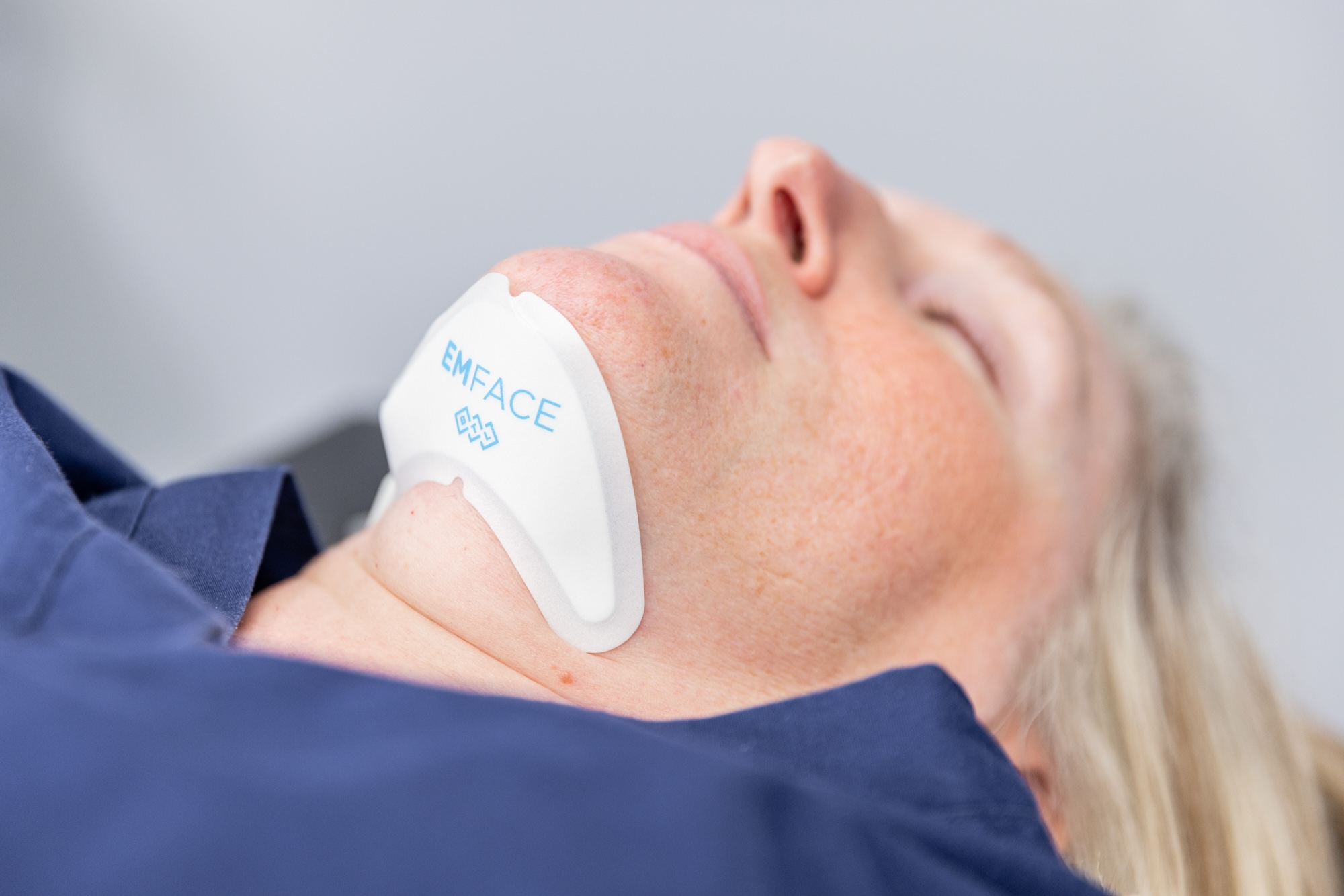 Woman at Harbour Direct Primary Care receiving Emface Submentum as treatment for facial contouring in Jamestown, RI.